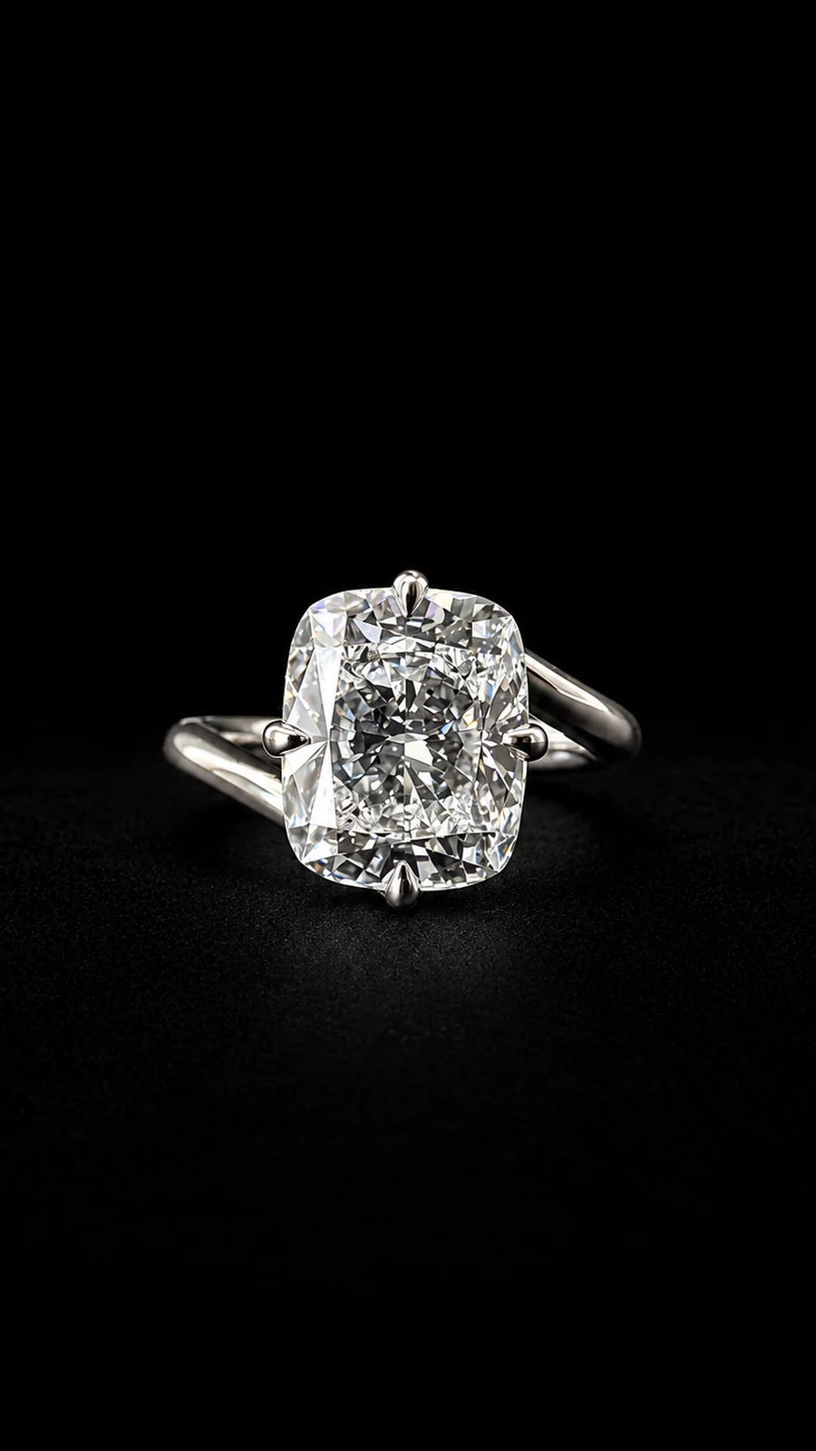 Bypass ring with an elongated centre stone on a black background
